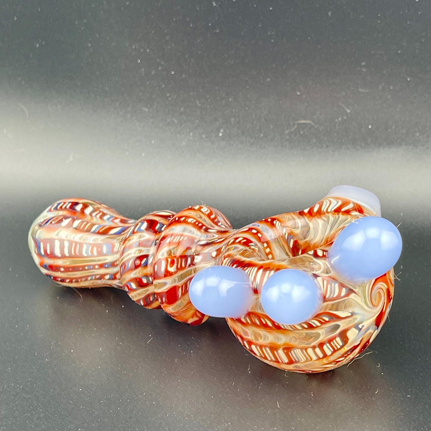 Wrap n Raked Red and Silver Fumed Spoon Pipe with light blue marbles