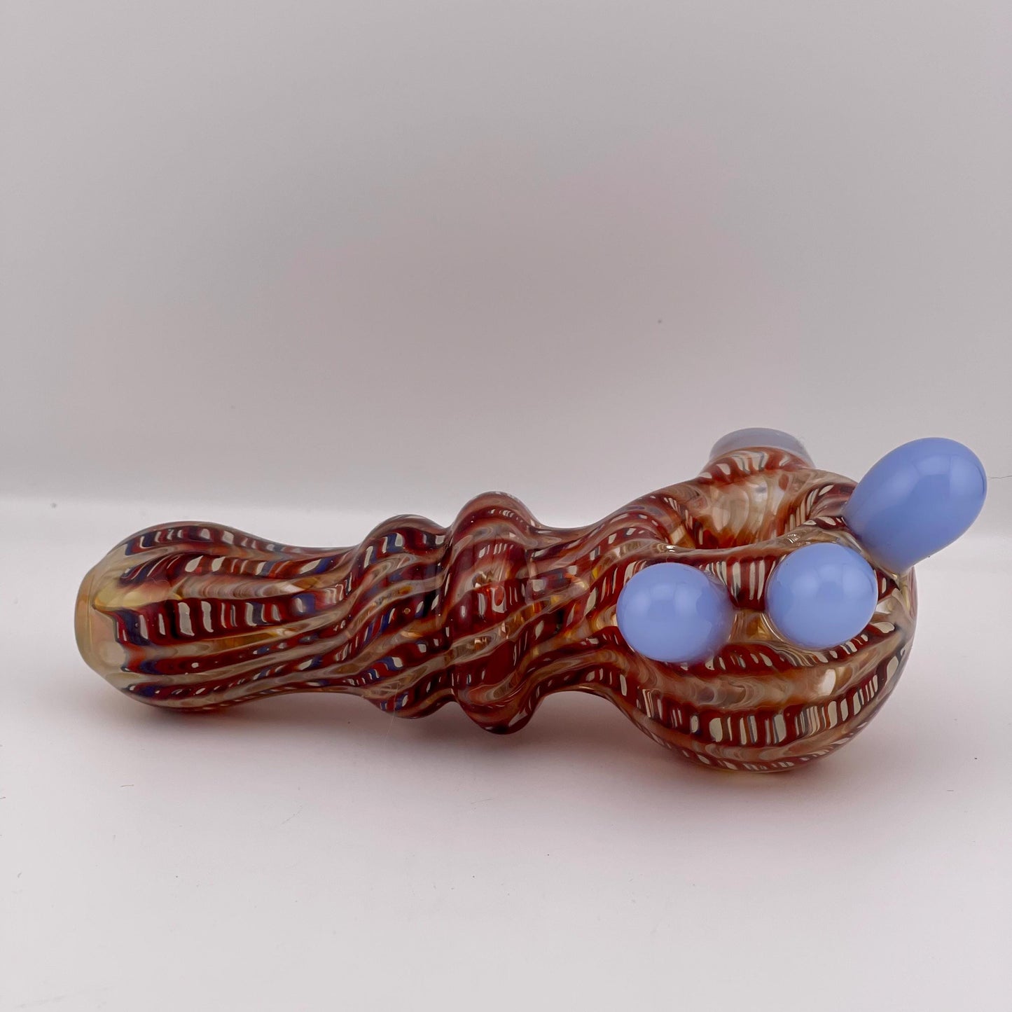 Wrap n Raked Red and Silver Fumed Spoon Pipe with light blue marbles