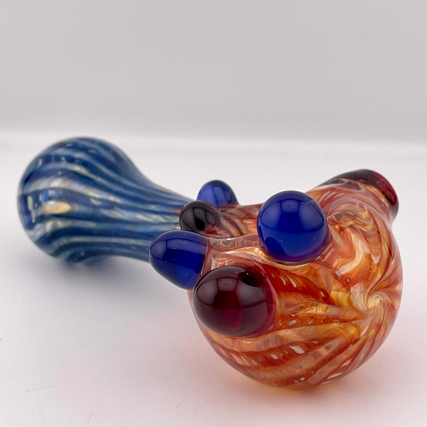 Wrap n Raked Red and Blue Silver Fumed Spoon Pipe with red and blue marbles