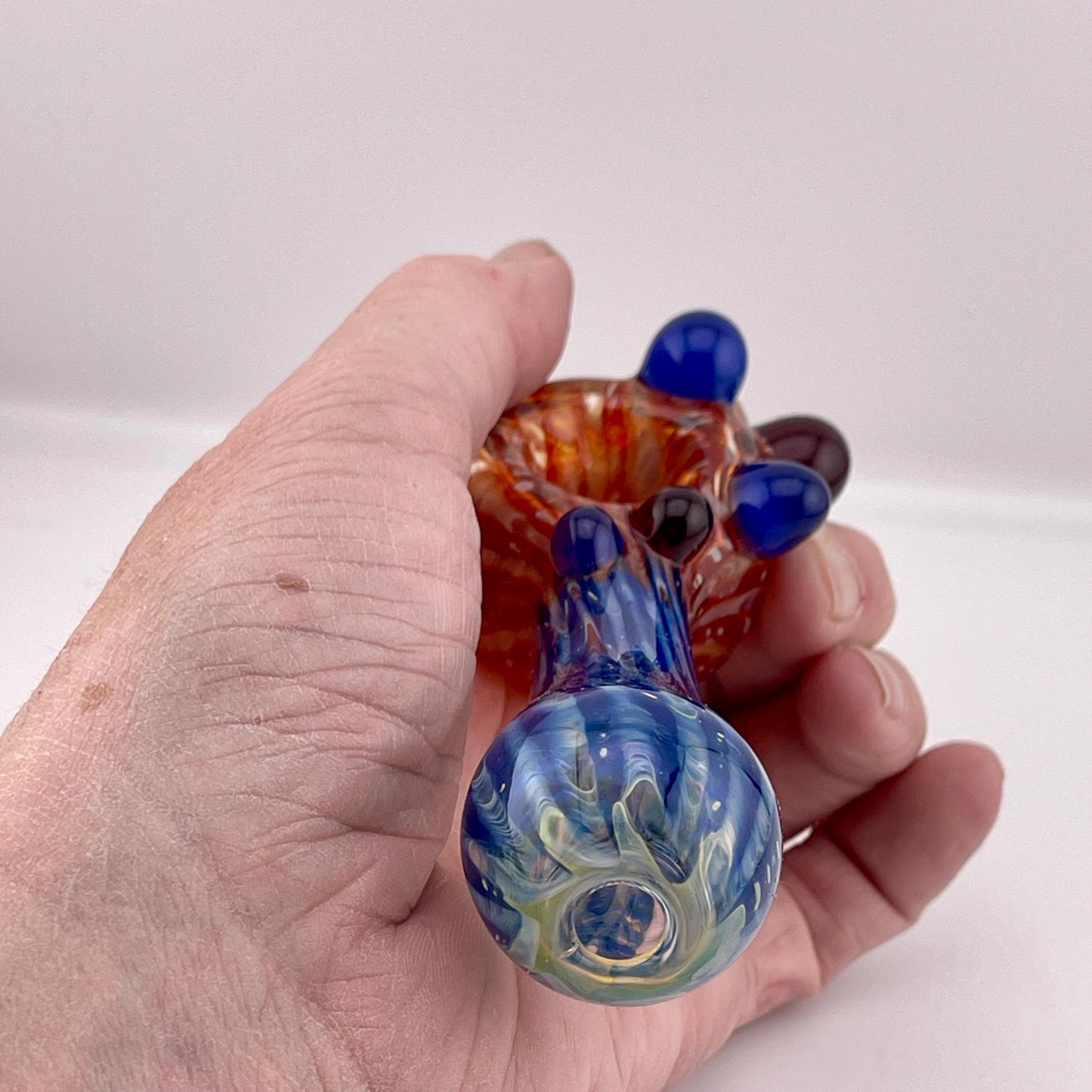 Wrap n Raked Red and Blue Silver Fumed Spoon Pipe with red and blue marbles