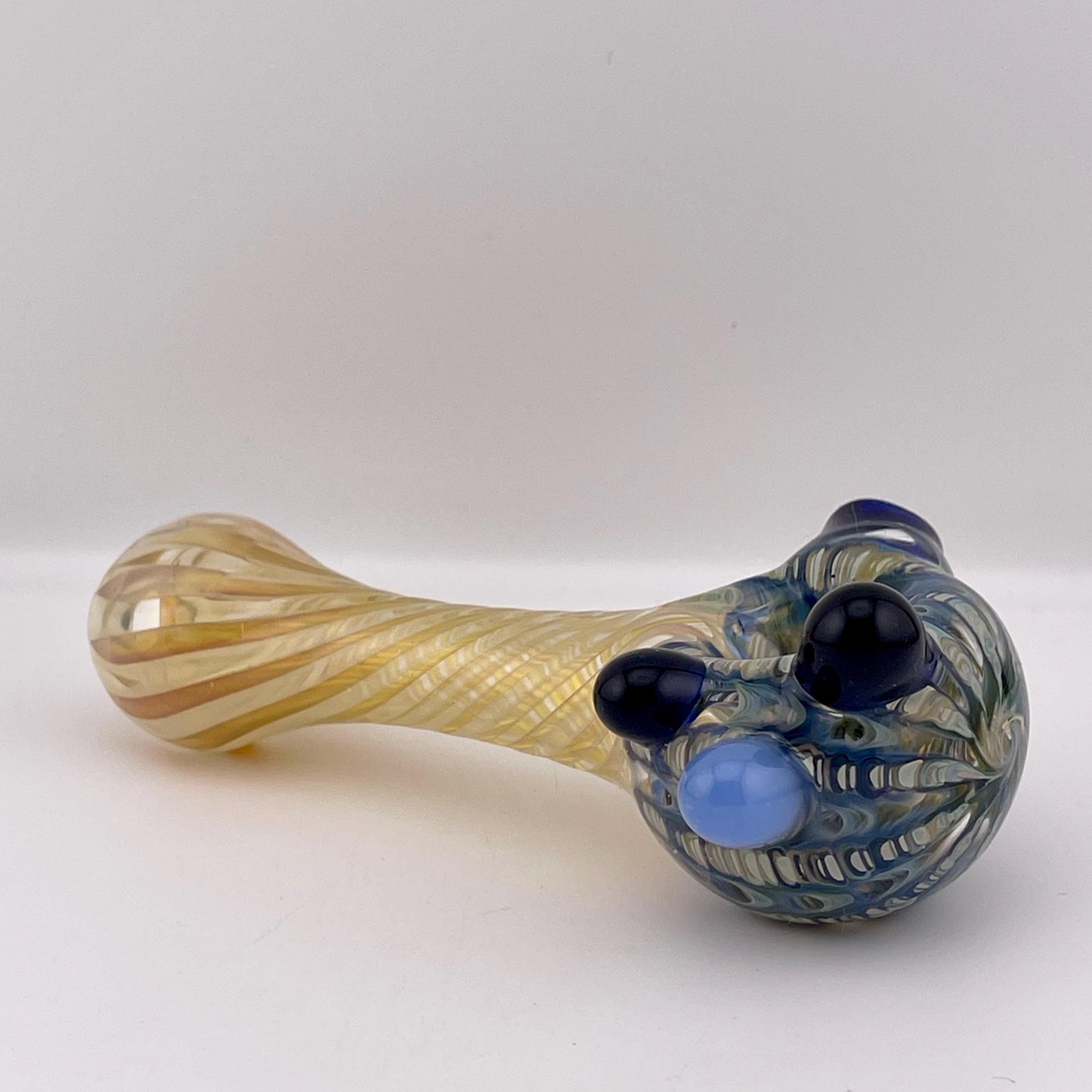 Wrap n Rake Twist Blue and Silver Fumed Spoon Pipe with light blue marbles