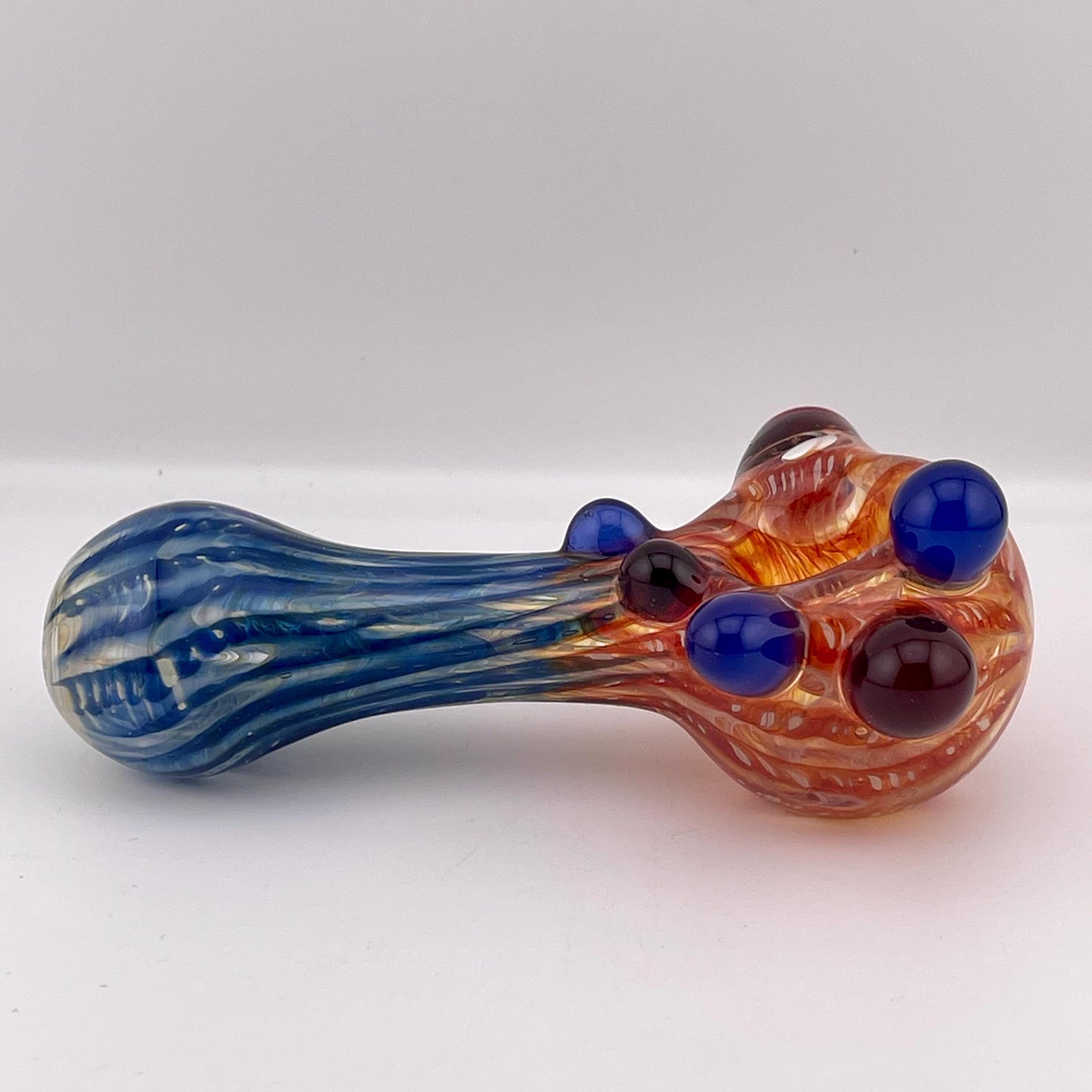 Wrap n Raked Red and Blue Silver Fumed Spoon Pipe with red and blue marbles