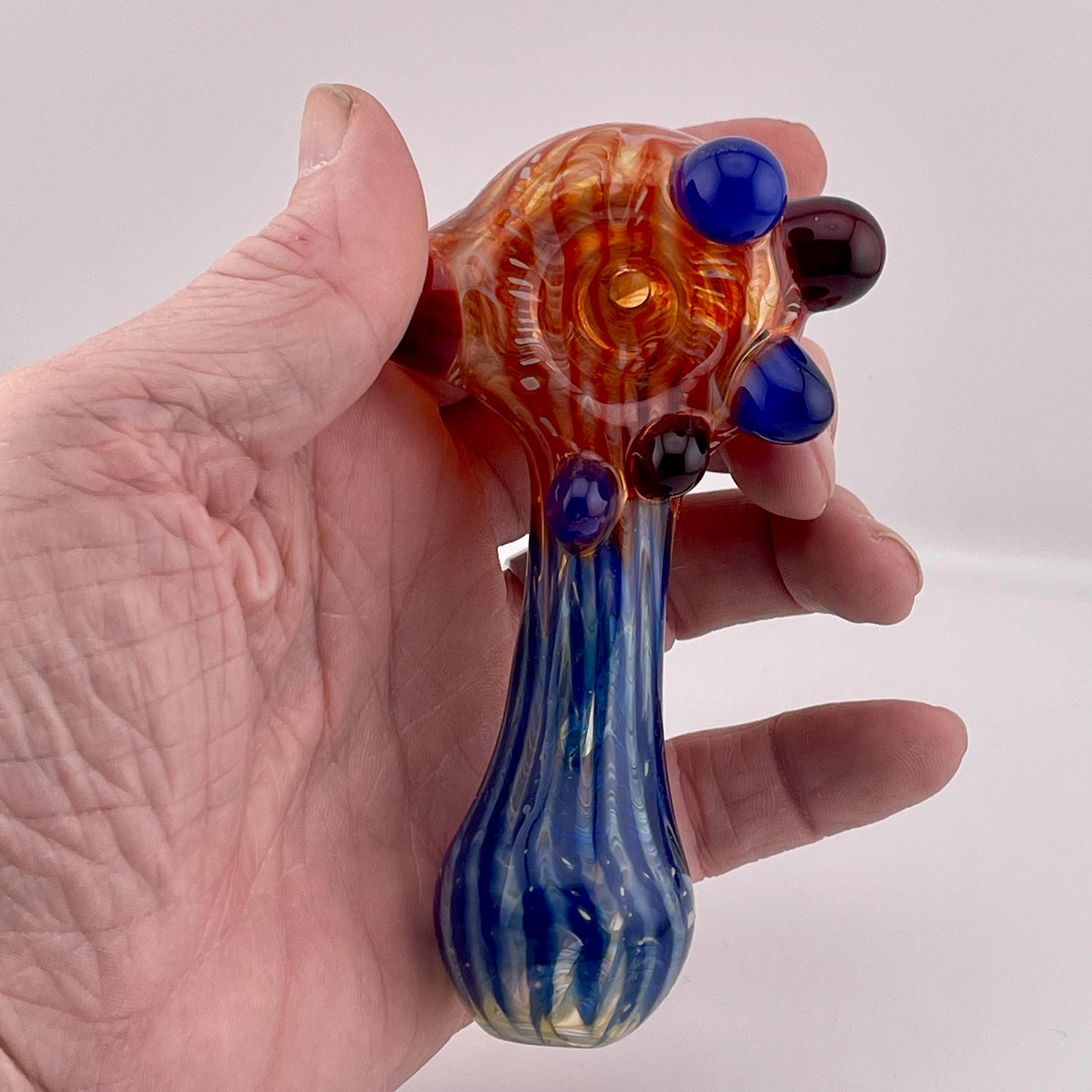 Wrap n Raked Red and Blue Silver Fumed Spoon Pipe with red and blue marbles