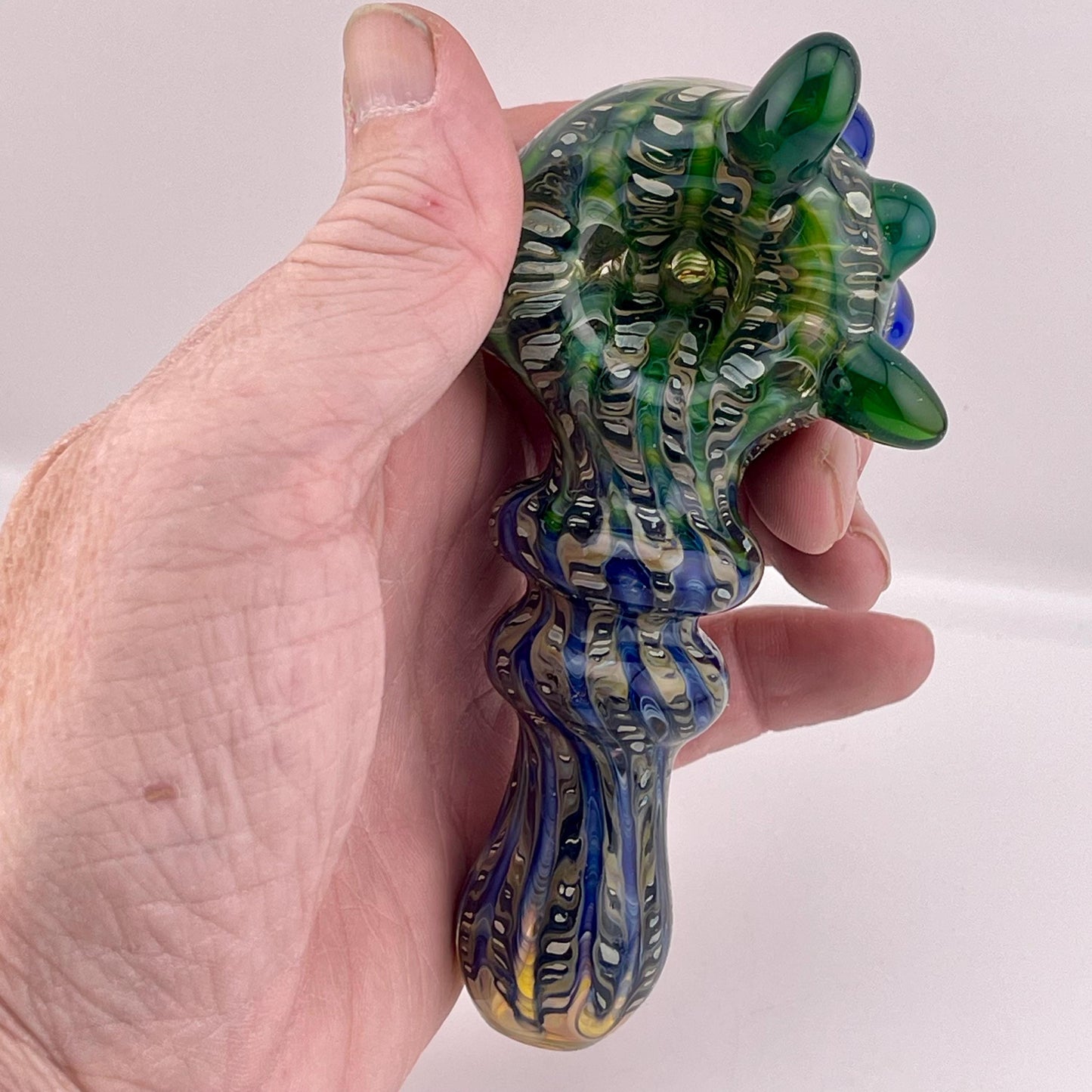 Wrap n Raked Blue and Green and Silver Fumed Spoon Pipe with light blue marbles