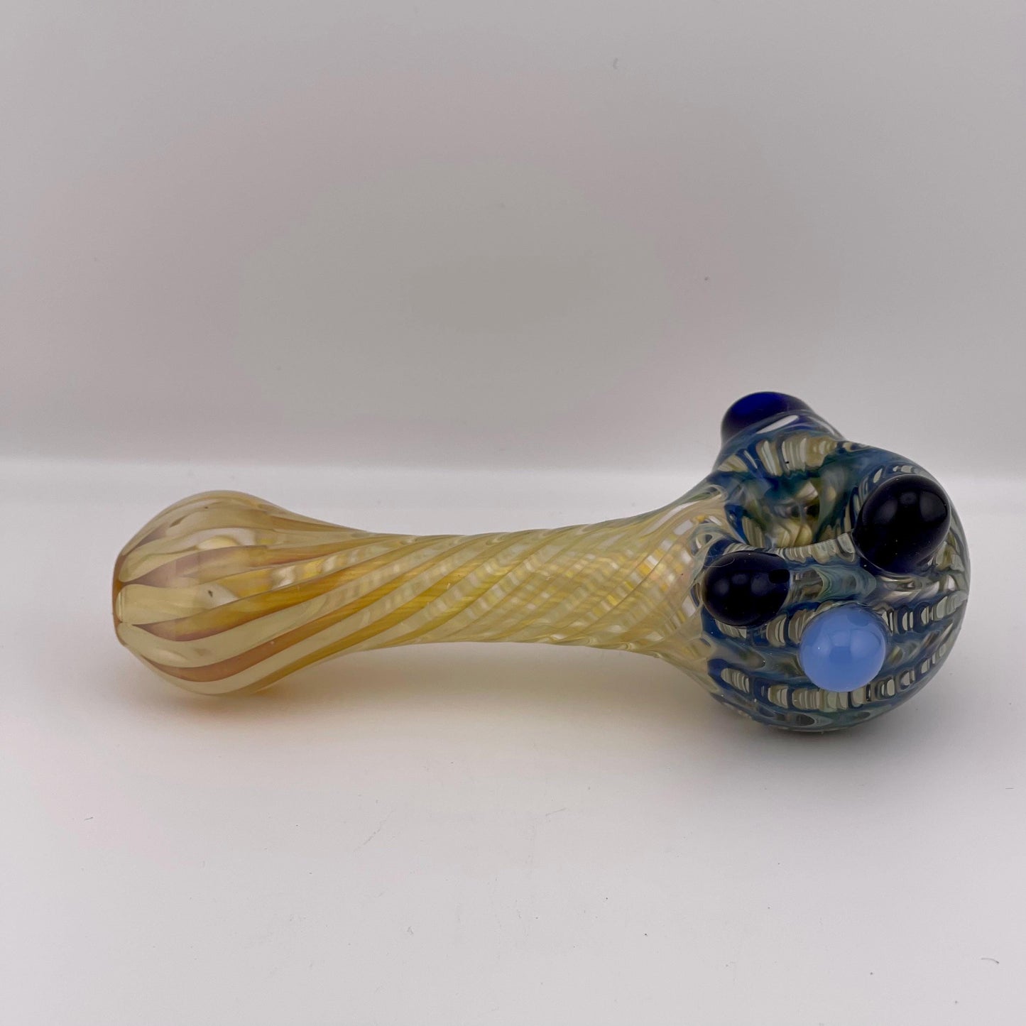 Wrap n Rake Twist Blue and Silver Fumed Spoon Pipe with light blue marbles