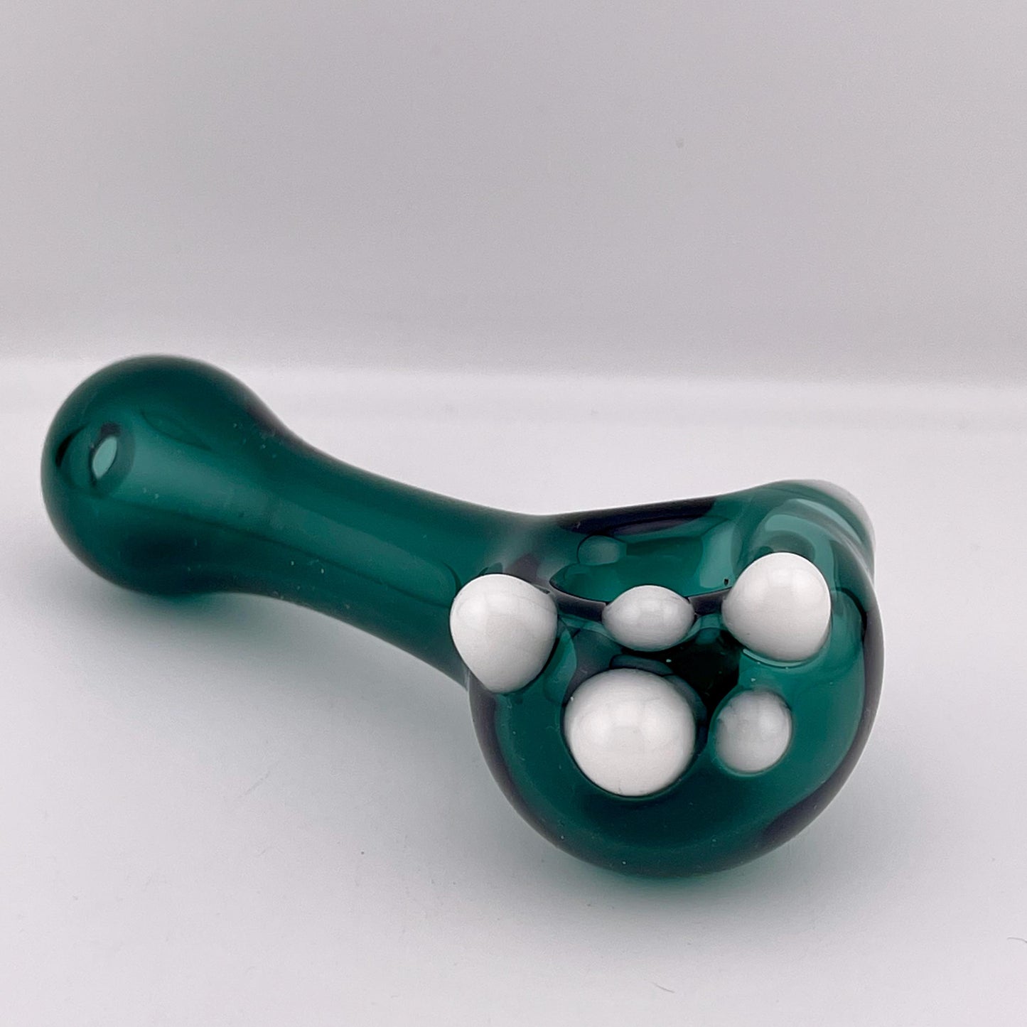 Solid Blue Green Spoon Pipe with white glow n the dark marbles